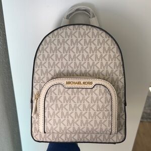 Michael Kors Jaycee XS Logo Backpack in Light Cream